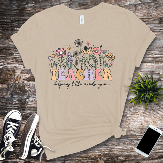 TeacherHelpingLittleMindsGrow